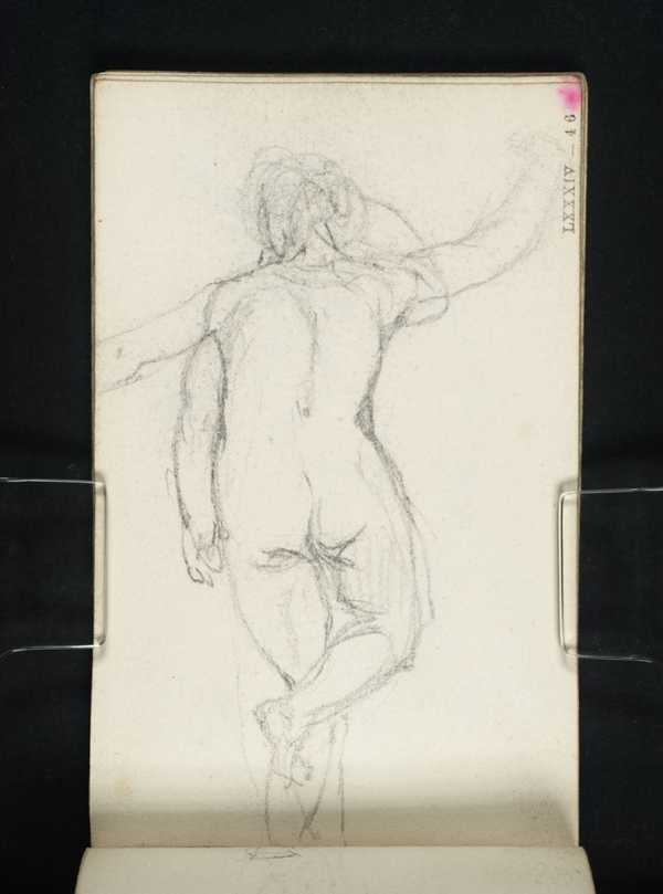 A Nude Woman Standing Seen From Behind Arms In Alternate Positions