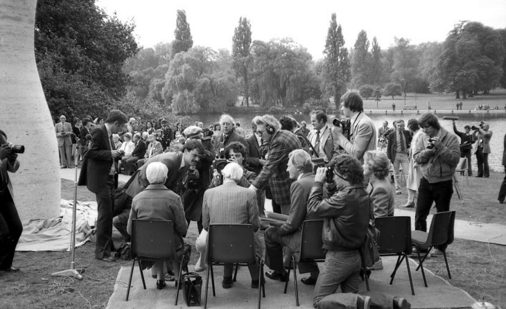 Gemma Levine 'Gemma Levine Reporters gathered around Henry and Irina Moore at the unveiling of 'The Arch' 1963–9 in Kensington Gardens, 1980'