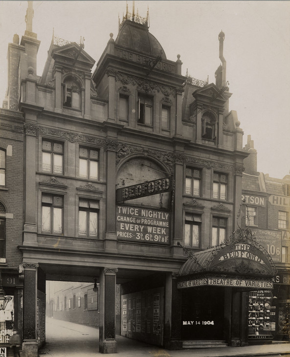 Ernest Milner 'London Transport photograph of 91–97 Camden High Street, with the Bedford Theatre of Varieties' 14 May 1904