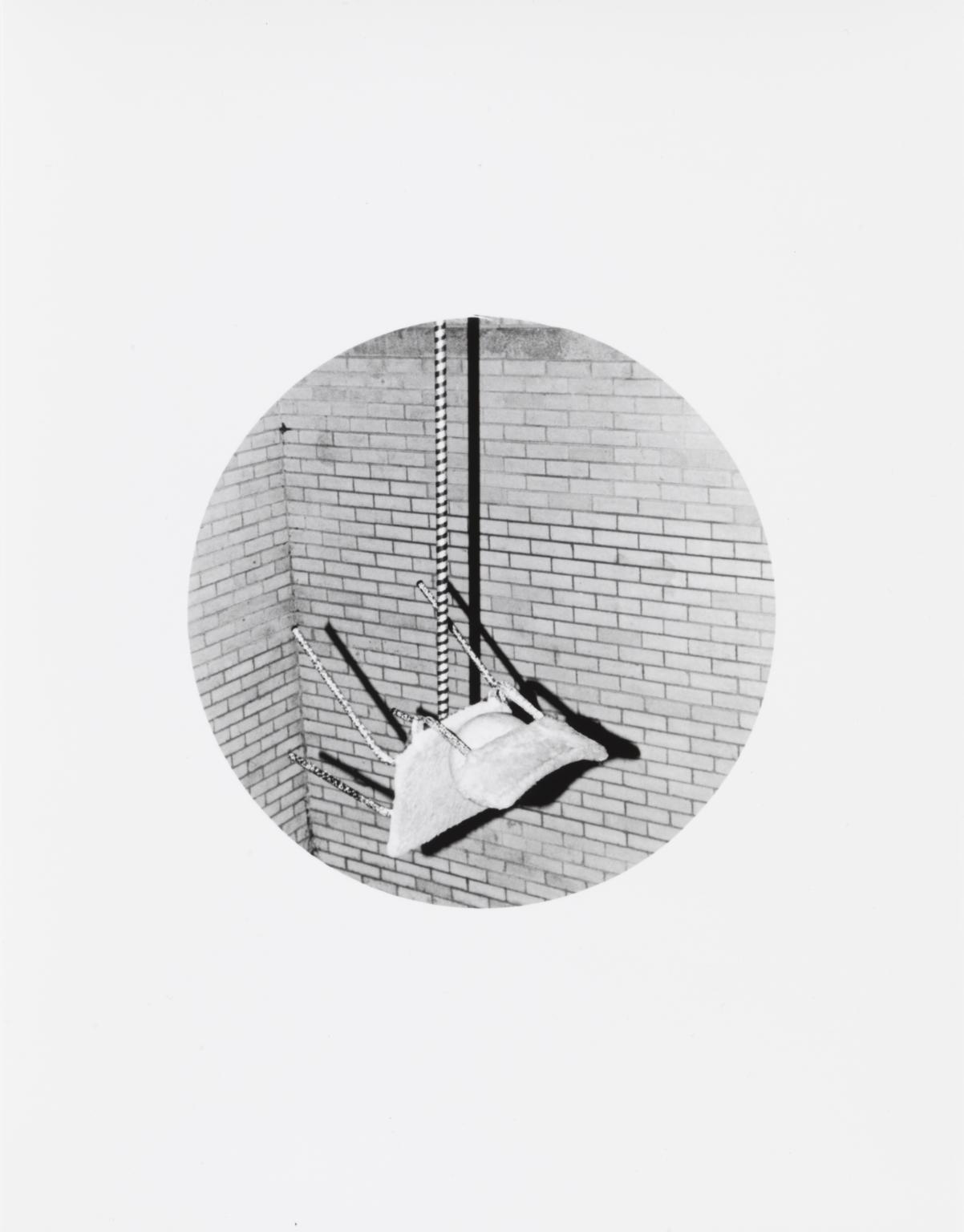 P13226: Untitled (Chair balancing on stick)