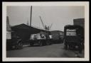 Prunella Clough, ‘Black and white photograph of trucks loaded with goods’ [1950s]