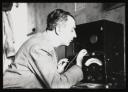Major H. O. Daniel, ‘Photograph of internee using recording equipment at Hutchinson Internment Camp’ [c.1940–1]