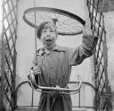 Nigel Henderson, ‘Photograph of an unidentified boy playing with bicycle parts’ [c.1949–c.1956]