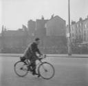 Nigel Henderson, ‘Photograph of an unidentified man on a bicycle’ [1953]