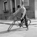 Nigel Henderson, ‘Photograph of Brian Samuels on a bicycle’ [1953]