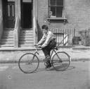 Nigel Henderson, ‘Photograph of Brian Samuels on a bicycle’ [1953]