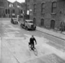 Nigel Henderson, ‘Photograph of an unidentified man on a bicycle’ [1953]