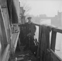 Nigel Henderson, ‘Photograph of an unidentified man alongside a river or canal’ [c.1949–c.1956]