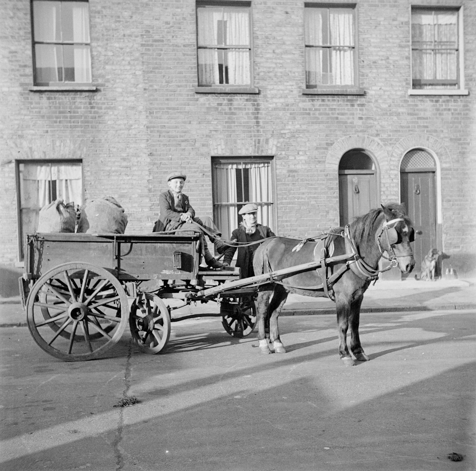 Photograph showing a knife grinder sharpening a knife on his cart', Nigel  Henderson, [c.1949–c.1956]', Nigel Henderson, [c.1949–c.1956] – Tate  Archive