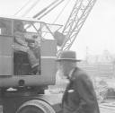 Nigel Henderson, ‘Photograph showing a man operating a crane’ [c.1949–c.1956]