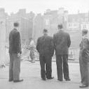 Nigel Henderson, ‘Photograph showing a group of men overlooking a construction site’ [c.1949–c.1956]