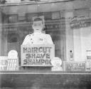 Nigel Henderson, ‘Photograph showing a barber shop window’ [c.1949–c.1956]