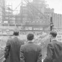 Nigel Henderson, ‘Photograph showing three men overlooking a construction site’ [c.1949–c.1956]