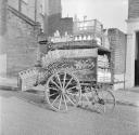 Nigel Henderson, ‘Photograph showing a cart carrying milk bottles’ [c.1949–c.1956]