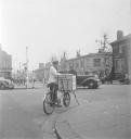 Nigel Henderson, ‘Photograph showing a street vendor with bicycle and basket’ [c.1949–c.1956]