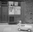 Nigel Henderson, ‘Photograph of an unidentified boy in a toy car’ [c.1949–c.1956]