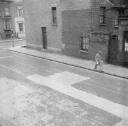 Nigel Henderson, ‘Photograph showing a man on an unidentified street’ [c.1949–c.1956]