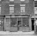 Nigel Henderson, ‘Photograph showing an unidentified shop front’ [c.1949–c.1956]