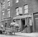 Nigel Henderson, ‘Photograph showing Shop front of Harris, scrap metal merchant’ [c.1949–c.1956]