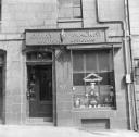 Nigel Henderson, ‘Photograph showing shop front of Berry & Mackay, nautical opticians’ [c.1949–c.1956]