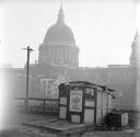 Nigel Henderson, ‘Photograph possibly showing a small shop, St Paul’s Cathedral in background’ [c.1949–c.1956]