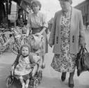 Nigel Henderson, ‘Photograph of two unidentified women and a child in a pushchair’ [c.1949–c.1956]