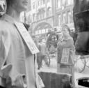 Nigel Henderson, ‘Photograph of an unidentified woman looking through a shop window’ [c.1949–c.1956]