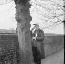 Nigel Henderson, ‘Photograph a man in uniform’ [c.1949–c.1956]
