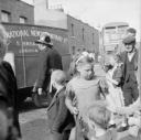Nigel Henderson, ‘Photograph showing adults and children on an unidentified busy street’ [c.1949–c.1956]
