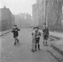 Nigel Henderson, ‘Photograph of three unidentified boys playing in the street’ [c.1949–c.1956]