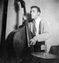Nigel Henderson, ‘Photograph of a musician performing on double bass’ [c.1949–c.1956]