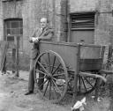 Nigel Henderson, ‘Photograph of Harry Craig standing beside a cart’ [c.1949–c.1956]