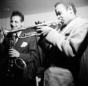 Nigel Henderson, ‘Photograph of a musician performing on trumpet, possibly Dizzy Reece, and an unidentified man’ [c.1949–c.1956]