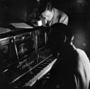 Nigel Henderson, ‘Photograph of two jazz musicians surrounding a piano’ [c.1949–c.1956]