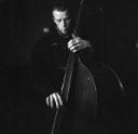 Nigel Henderson, ‘Photograph of a musician performing on a double bass’ [c.1949–c.1956]