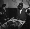 Nigel Henderson, ‘Photograph showing jazz musicians playing table football’ [c.1949–c.1956]
