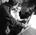 Nigel Henderson, ‘Photograph of Jack Parnell performing on piano with an unidentified man’ [c.1949–c.1956]
