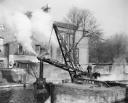 Nigel Henderson, ‘Photograph showing steam powered crane on a barge’ [c.1949–c.1956]