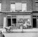 Nigel Henderson, ‘Photograph showing shop front of A. Lescure & Sons, upholsterers’ [c.1949–c.1956]
