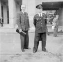 Nigel Henderson, ‘Photograph showing two unidentified men, one in uniform’ [c.1949–c.1956]