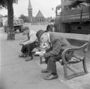 Nigel Henderson, ‘Photograph showing two unidentified elderly men sitting on a bench’ [c.1949–c.1956]