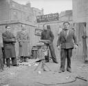 Nigel Henderson, ‘Photograph showing a street entertainer performing’ [1952]
