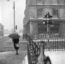 Nigel Henderson, ‘Photograph showing pedestrian on pavement, snow on the ground’ [c.1949–c.1956]