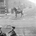 Nigel Henderson, ‘Photograph showing a man riding a horse’ [c.1949–c.1956]