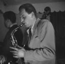 Nigel Henderson, ‘Photograph showing an unidentified jazz musician, performing on saxophone’ [c.1949–c.1956]