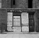 Nigel Henderson, ‘Photograph showing shop front boarded up’ [c.1949–c.1956]