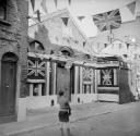 Nigel Henderson, ‘Photograph showing an unidentified building decorated to mark the Coronation’ [1953]