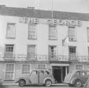 Nigel Henderson, ‘Photograph showing exterior of a building, possibly a hotel called The George’ [1953]