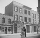 Nigel Henderson, ‘Photograph showing shop fronts’ [c.1949–c.1956]