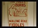 Conrad Atkinson, ‘Colour photograph of a poster depicting a burning building with the caption, ‘The Falls Burns, Malone Road Fiddles’’ [c.1974–5]